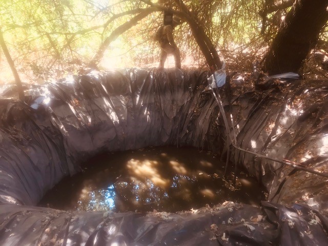 Mixing pond found at an illegal grow  on CDFW property.